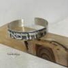 Unique Hebrew Sterling Silver Cuff Bracelet Matte — styled shot, handmade in Israel