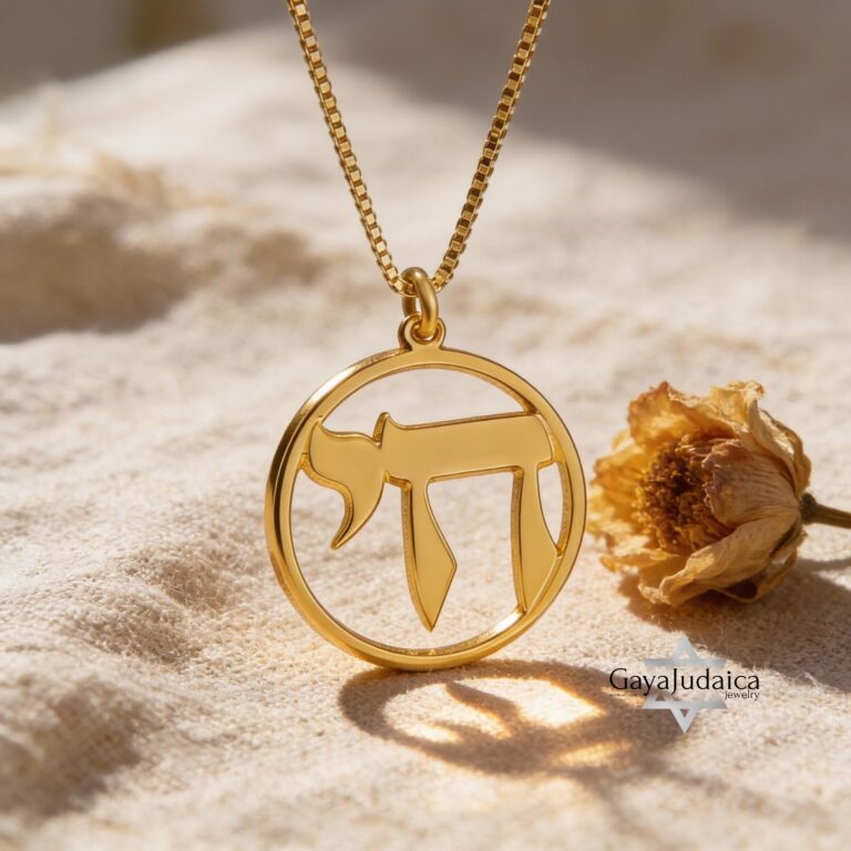 14K solid gold round Chai pendant necklace with a classic Jewish life symbol.