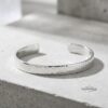 Hammered cuff bracelet with hidden engraving — handmade Judaica — view 11