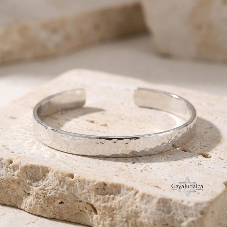 Hammered cuff bracelet with hidden engraving — handmade Judaica — main view