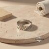 Sterling silver ring with Western Wall design and inner engraving, displayed in an elegant gift box – handcrafted unisex