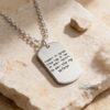 A personalized Hebrew engraved dog tag necklace crafted in 925 sterling silver or 24K gold-plated, featuring custom Hebr