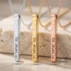 Custom Hebrew bar necklace shown in sterling silver, 24K gold, and rose gold