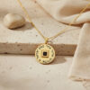 Gold plated Shema Yisrael pendant necklace with engraved Hebrew prayer on a travertine stone