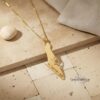 Gold Israel map necklace with linen backdrop