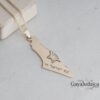 Close-up of the Star of David cut-out in the gold Israel map pendant