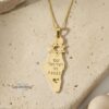 14K gold Israel map memorial necklace on travertine