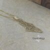 Gold Israel map Shema pendant on a pale textured ground