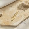 Yellow gold Shema Israel map necklace on marble