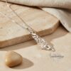 White gold Shema Israel map pendant on stone with linen