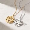 Yellow and white gold Shema Israel pendants shown side by side