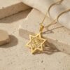 14K gold Am Yisrael Chai star pendant on Jerusalem stone