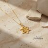 14K gold Am Yisrael Chai Star of David necklace on travertine