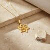 Solid gold Magen David pendant on a fine box chain
