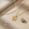Gold Shema Yisrael Star of David pendant on stone with linen