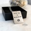 Silver IDF dog tag pendant with Star of David on a gift box
