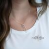 Woman wearing the sterling silver Israel map and Star of David necklace