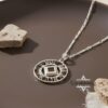 Openwork Shema Yisrael pendant with figaro chain on ceramic