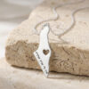 925 sterling silver engraved Israel map necklace with cut-out heart on travertine stone