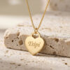 14K solid gold heart necklace engraved with a name on Jerusalem stone