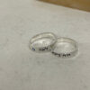 Two stacked sterling silver Hebrew name rings with birthstones