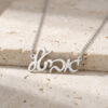Personalized Hebrew script name necklace in sterling silver on stone