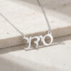 Custom Hebrew name necklace in 925 sterling silver on travertine