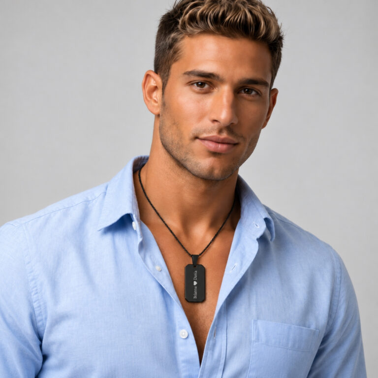 Man in a light blue shirt wearing the engraved onyx dog tag necklace for men