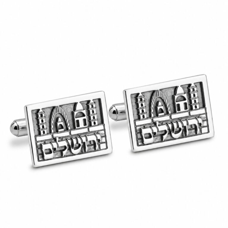 Pair of personalized Jerusalem cufflinks in sterling silver on a white background, showing the Old City gate design and Hebrew engraving
