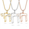 Gold, silver and rose gold open outline Hebrew Chai necklaces side by side on a white background