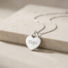 14K white gold engraved name heart pendant on stone