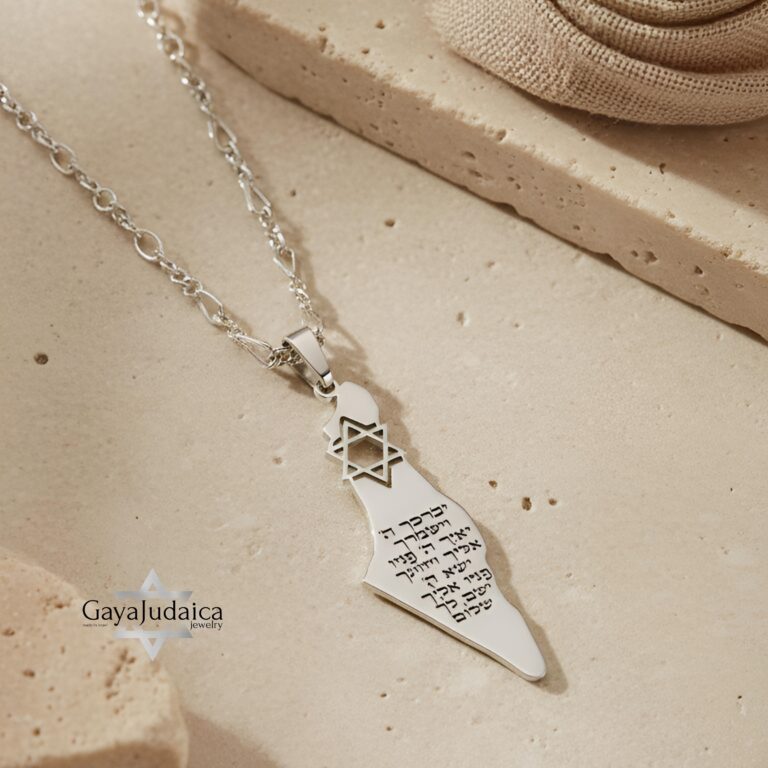 Israel Map Necklace with Hebrew Bible Verse — engraved Israel map pendant resting on stone