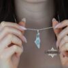 Israel Map Necklace with Hebrew Bible Verse — model wearing the engraved Israel map necklace