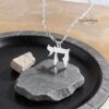 Hebrew Chai Necklace with Israel Map — Chai pendant displayed on slate and stone