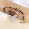 Israel Map Necklace with Engraved Bible Verse — map pendant on a wooden beam