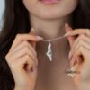 Shema Yisrael Israel Map Necklace — pendant held up to show the engraved prayer