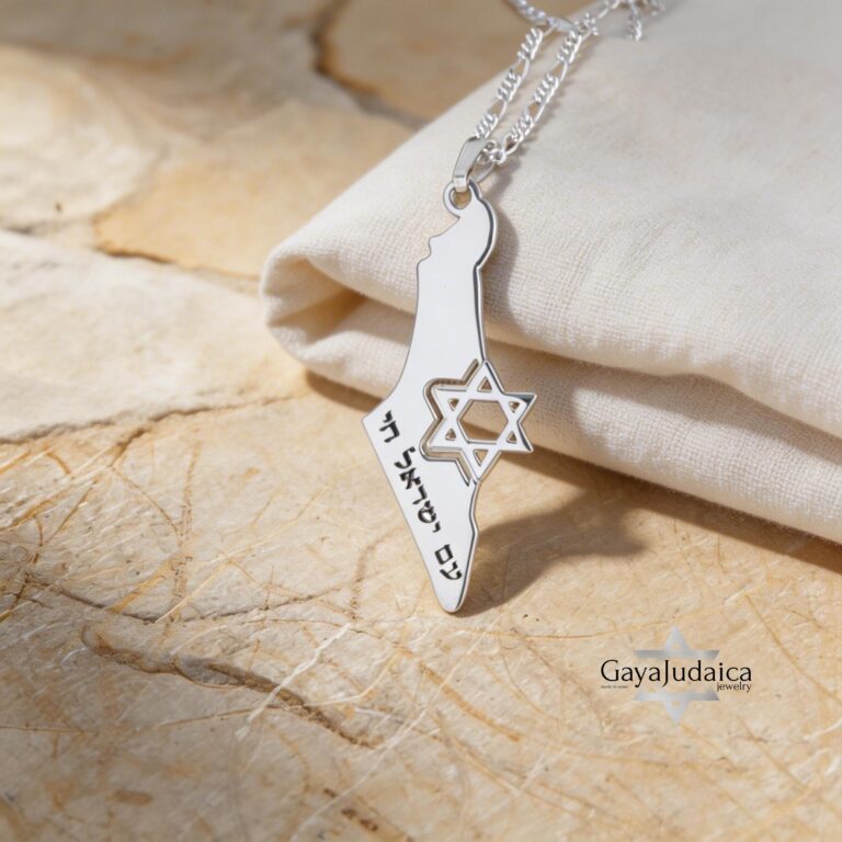 Israel Map Necklace with Cut-Out Star of David — silver Israel map pendant on a soft cushion