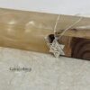 Gold Shema Yisrael star pendant on stone with linen