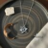 Man wearing the gold plated Shema Yisrael Star of David necklace