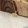Solid 14K gold mini Chai pendant, handmade in Israel
