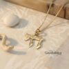 Solid gold hammered Chai pendant, handmade in Israel