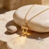 Solid 14K gold mini Chai pendant, handmade in Israel