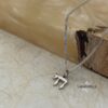 Solid 14K gold mini Chai pendant, handmade in Israel
