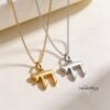 Solid 14K gold mini Chai pendant, handmade in Israel