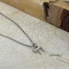 Solid 14K gold mini Chai pendant, handmade in Israel