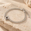 Nano Bible Bracelet in sterling silver on natural travertine stone, square Hebrew Tanakh pendant on a Cuban link chain with lobster clasp and extender