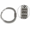 Zoomed detail of engraved Hebrew name beads on a personalized dad bracelet, full bracelet in view