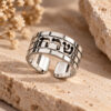 14K white gold Hebrew name ring with Western Wall brick texture on travertine stone
