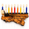 Black olive wood Hanukkah menorah with colorful lit candles