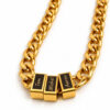 Gold tone stainless steel Cuban chain with three black engraved name beads on white, Hebrew name bead necklace for dad